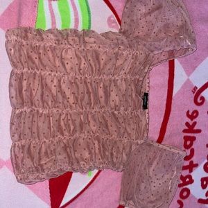 Medium, pinkish polka dot blouse